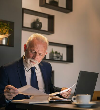 Senior businessman reading a contract